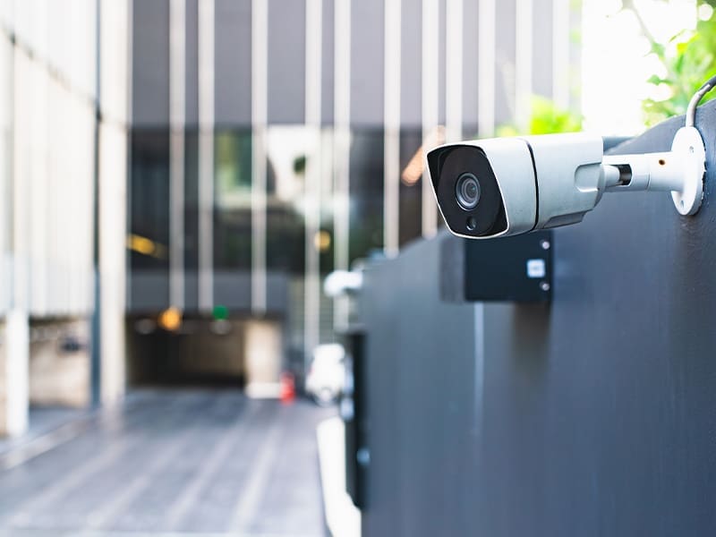 security camera mounted on the side of a building