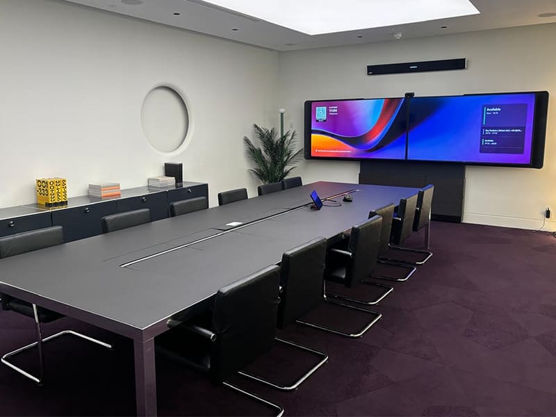 conference room with a flat screen tv on the wall