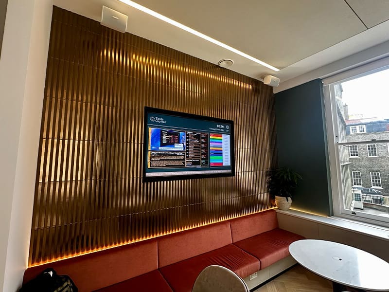 room with a couch, table, and television