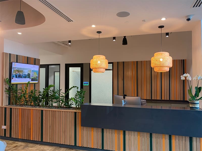 reception area with a desk and chairs