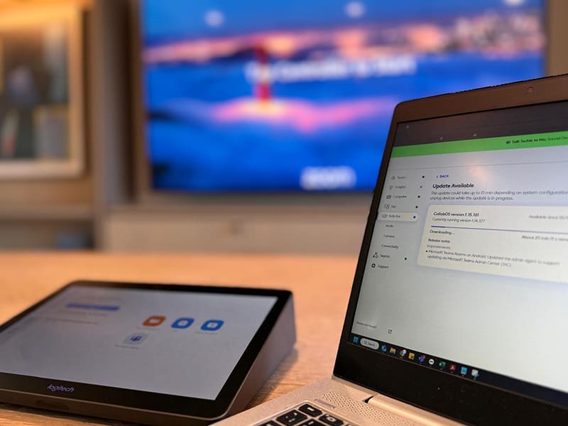 laptop and a tablet sitting on a table