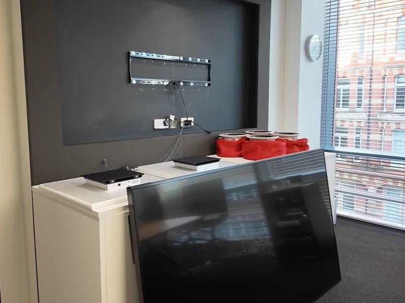 black and white room with a large window