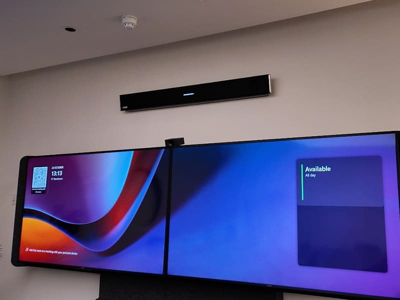 flat screen tv mounted to a wall
