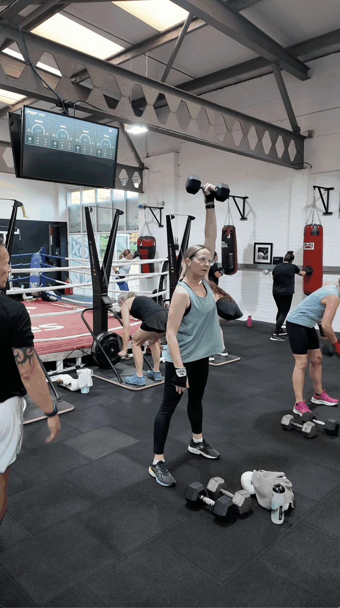 group of people working out in a gym